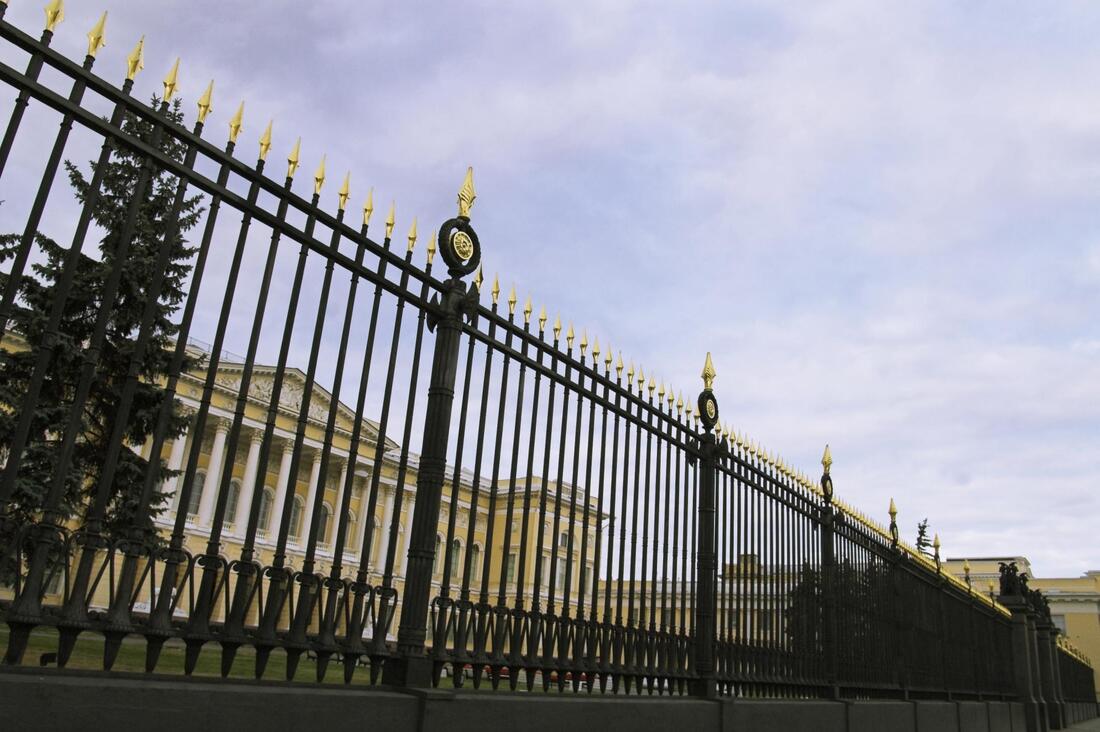 a wrought iron fence